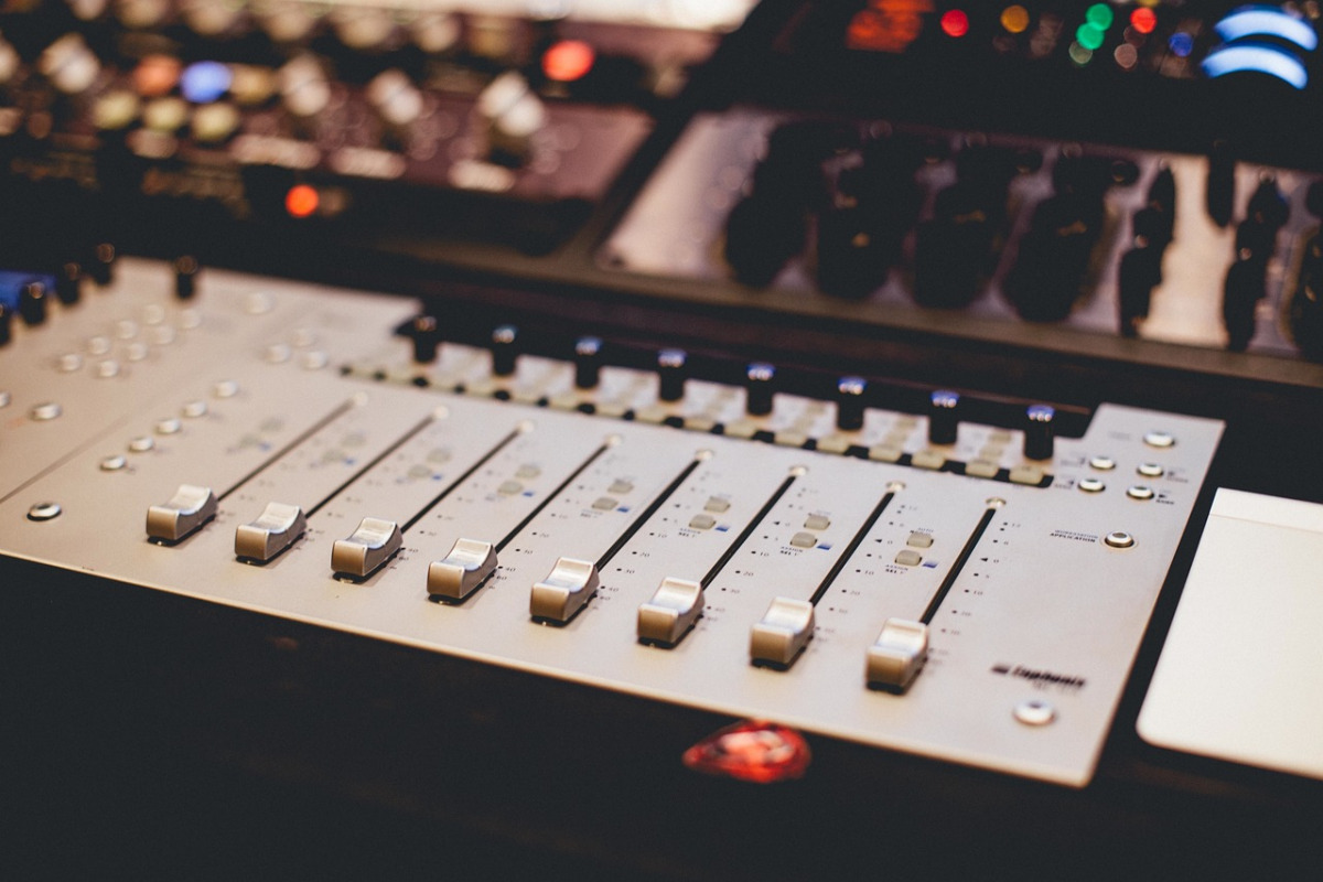 mixing and mastering console in recording studio